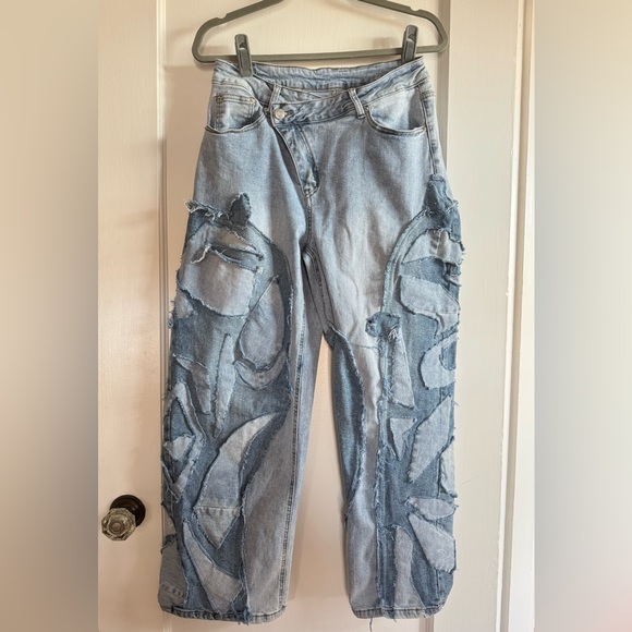 Denim - Custom Patchwork Light Wash Denim Jeans with Abstract Appliqué